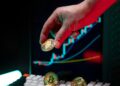 A digital graph showing Bitcoin trends with the Frankfurt skyline in the background.