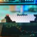 Data charts and graphs analyzing cryptocurrency trends and insider trading implications.
