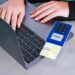 Bitcoin symbol overlaying a payment terminal with the Square logo, highlighting crypto transactions.