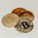 Cardano logo with rising graph and digital currency symbols reflecting price surge.