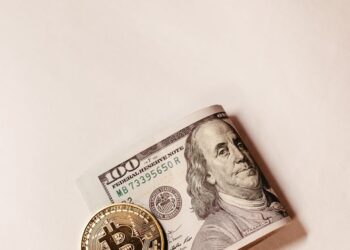 An infographic showing a digital wallet with dollar signs and blockchain symbols for payments.