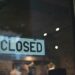 A closed storefront with a "Temporarily Closed" sign, reflecting Kalshi's halted operations.