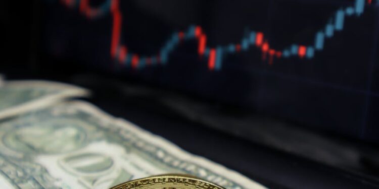 Bitcoin coin with a fluctuating stock chart background, symbolizing market reactions to news.