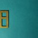 A digital illustration of a stablecoin symbol with gold bars in the background.
