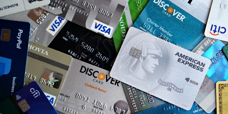 Nium's new card platform featuring stablecoins alongside Visa and Mastercard logos.