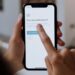 User scrolling through a Telegram app with fake Ripple account notifications visible.