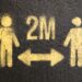 Two trading platforms logos with a warning sign, symbolizing insider trading prevention measures.