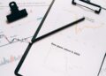 Swan Bitcoin logo with legal documents and financial charts in the background.