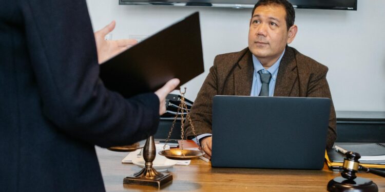 A courtroom scene with lawyers discussing cryptocurrency legal issues.
