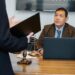 A courtroom scene with lawyers discussing cryptocurrency legal issues.