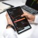 A financial advisor reviews cryptocurrency regulations on a digital tablet.
