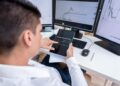 Traders analyzing cryptocurrency trends with charts and graphs showing S&P 500 futures data.