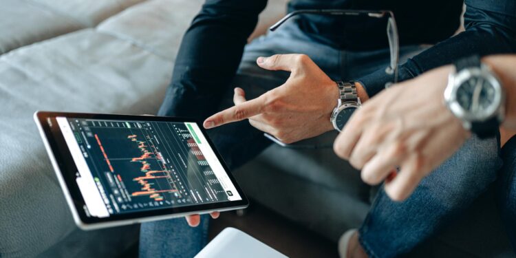 Visa employees discussing AI technology related to cryptocurrency payments.
