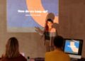 Mark Zuckerberg speaks at a conference, presenting an AI agent for Meta leadership.