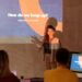 Mark Zuckerberg speaks at a conference, presenting an AI agent for Meta leadership.