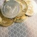 U.S. lawmakers discussing cryptocurrency regulation with digital tokens on a table.