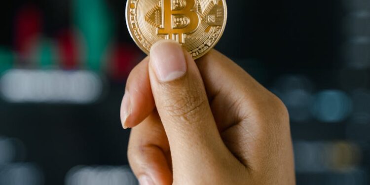 A lawyer holds a gavel with digital currency symbols in the background, representing finance and crypto.