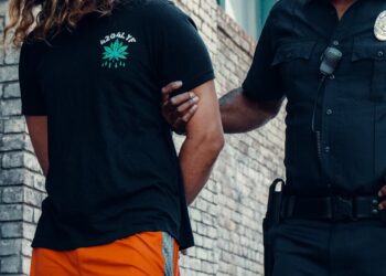 Spanish Civil Guard officers arrest a suspect involved in a crypto-related kidnapping case.
