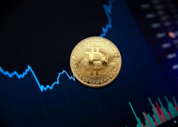 A Bitcoin coin and stock chart symbolizing cryptocurrency investment growth.
