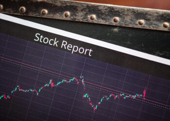 Graph showing a steep rise in urea prices alongside a fluctuating market chart.