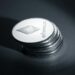 Ethereum logo with stacks of coins, symbolizing the $46M staking move in cryptocurrency.