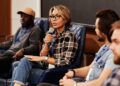 Charles Hoskinson speaks at a conference, discussing crypto investments and Midnight's launch.