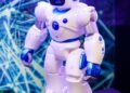 Contestants showcase AI personalities at a tech event, highlighting innovation and competition.