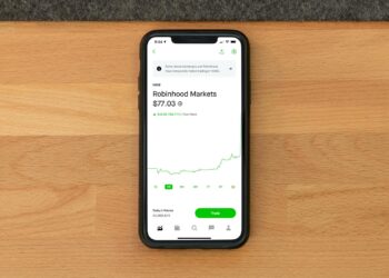 Robinhood logo with financial charts and logos of Stripe and ElevenLabs in the background.