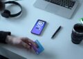 Android smartphone displaying a cryptocurrency wallet app with security warning alerts.