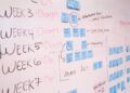 Developers collaborating on a blockchain project, showcasing Solana's institutional platform launch.