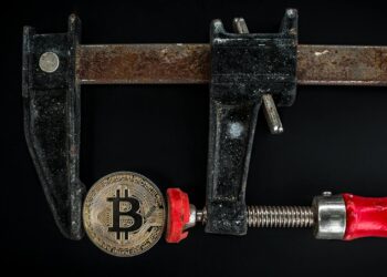 A digital graphic illustrating a broken bridge, symbolizing crypto security vulnerabilities.