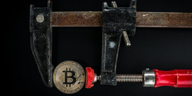 A digital graphic illustrating a broken bridge, symbolizing crypto security vulnerabilities.