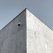 Coinbase building exterior with a digital asset custody security graphic overlay.