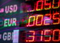 Washington D.C. skyline with a stock market screen overlay, symbolizing finance regulations.