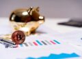 U.S. Bank logo with Bitcoin symbol and financial charts in the background.
