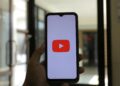 User interacting with YouTube's new AI deepfake tool for creating engaging Shorts content.