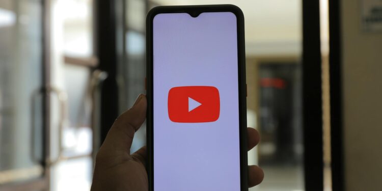 User interacting with YouTube's new AI deepfake tool for creating engaging Shorts content.