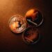 A graphic showing Cardano's logo alongside Bitcoin symbols and scaling charts.