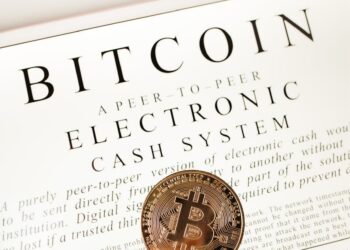 A Cambodian official signs new legislation aimed at combating cryptocurrency fraud.