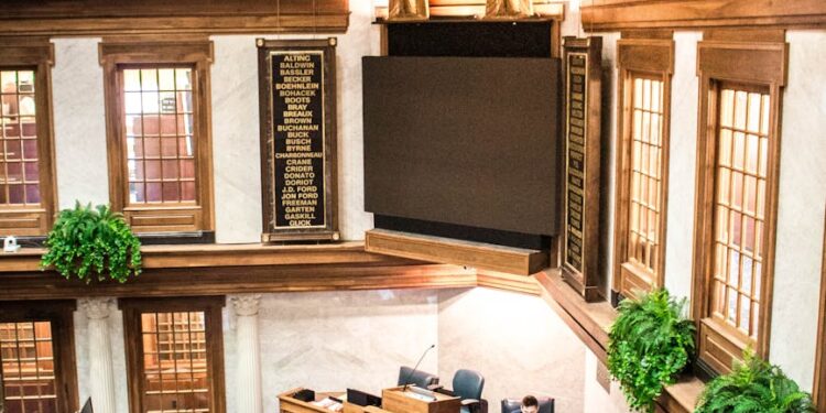 Senator Tillis speaking at a podium during a Senate committee meeting on financial regulations.