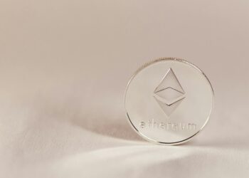 A digital graphic showcasing Ethereum blockchain elements and DeFi transactions.