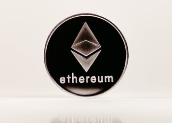 Logo of AITECH Cloud Network with Ethereum symbols illustrating rebranding in crypto finance.