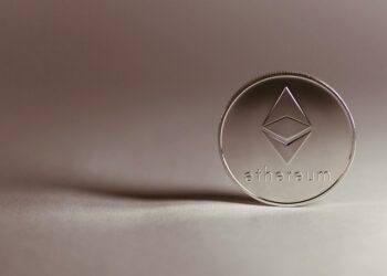 Illustration of a digital coin with the Mercado Libre logo, symbolizing cryptocurrency discontinuation.