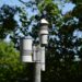Weather sensor equipment displayed with police tools in a regulatory setting.