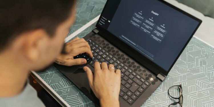 A developer using a laptop with blockchain graphics, showcasing Certik's AI Auditor tool.
