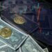 A close-up of a blockchain graphic overlaying a financial chart and dollar bills.