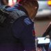 Regulators inspect a cryptocurrency trading hub during an enforcement operation.