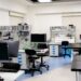 AI chips from Meta and Amazon stacked in a tech lab environment.