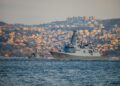 US Navy destroyer positioned near the Strait of Hormuz amid heightened geopolitical tensions.
