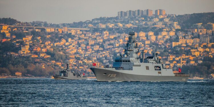 US Navy destroyer positioned near the Strait of Hormuz amid heightened geopolitical tensions.